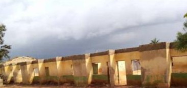 The four-classroom block, rebuilt, before the work